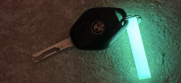 A key with the bmw logo on it.