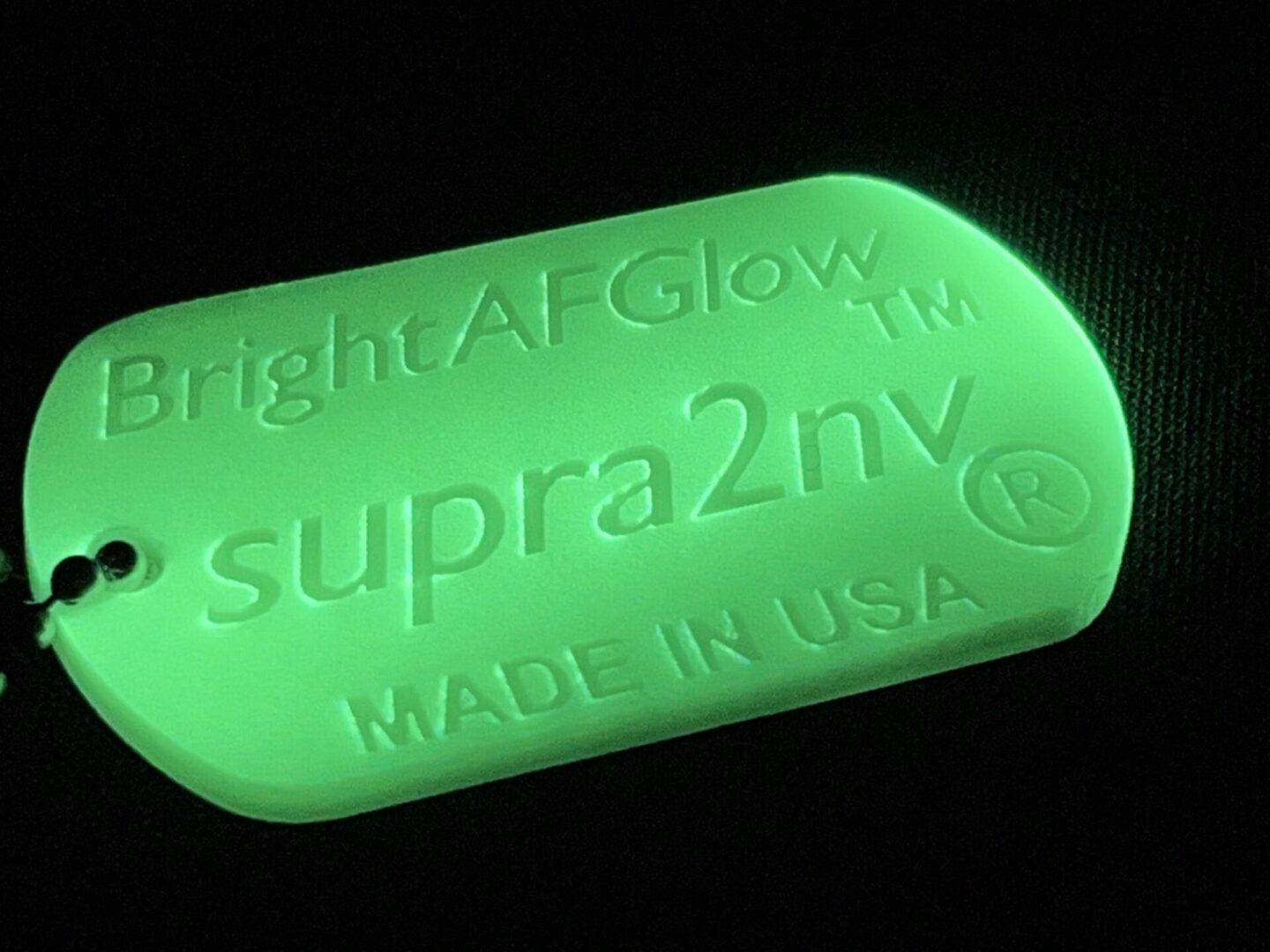A glowing green bar of soap sitting on top of a table.