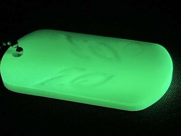 A green glow in the dark plastic cutting board.