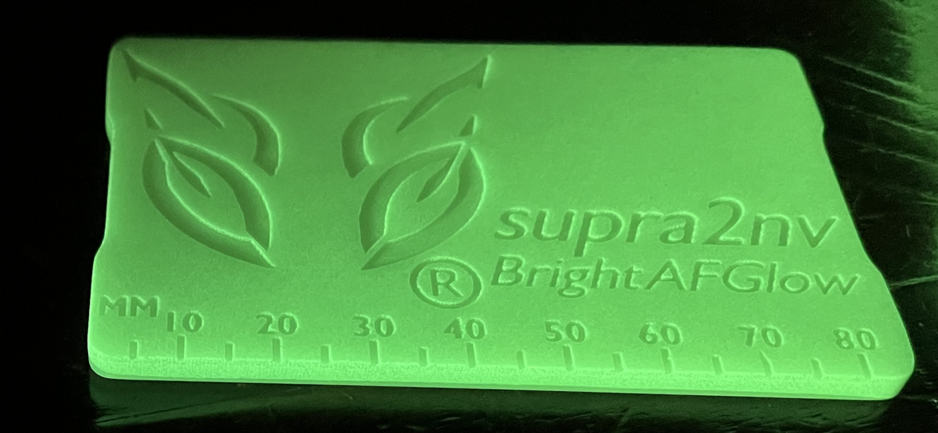 A green light is shown with the words " supra bright arrow ".